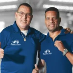 Friendly team members of Ruben’s Tires smiling with confidence, representing the trusted service and commitment behind About Rubens Tires Central Florida.